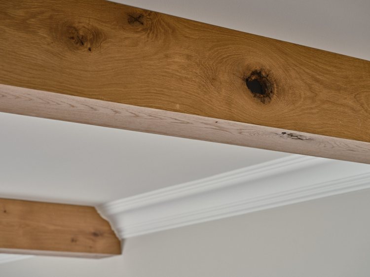 White oak ceiling cladding with faux beam
